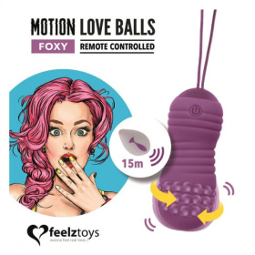 Фиолетовые вагинальные шарики с вращением бусин Remote Controlled Motion Love Balls Foxy фото в интим магазине Love Boat