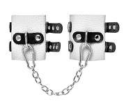 
Бело-черные наручники с двумя ремешками и люверсами фото в интим магазине Love Boat