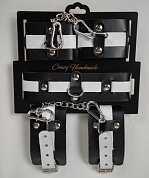 
Набор фиксаторов из черной и белой натуральной кожи фото в интим магазине Love Boat