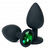 Черная силиконовая анальная пробка с зеленым стразом - 8 см.