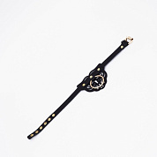 
Черный чокер с клепками и золотистой фурнитурой фото в интим магазине Love Boat