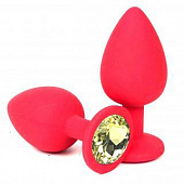 Красная силиконовая анальная пробка с желтым стразом - 6,8 см.