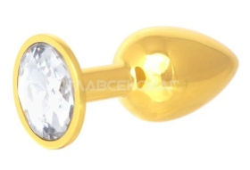 
Золотистая анальная пробка с прозрачным кристаллом - 7 см. фото в интим магазине Love Boat