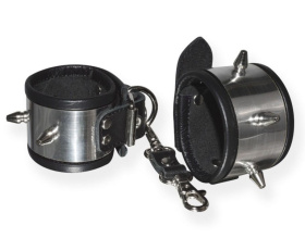 
Серебристо-черные наручники с шипами и металлическим блеском фото в интим магазине Love Boat