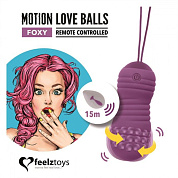Фиолетовые вагинальные шарики с вращением бусин Remote Controlled Motion Love Balls Foxy фото в интим магазине Love Boat