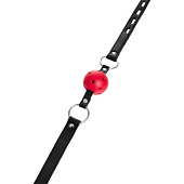 Красный кляп-шар на черных ремешках