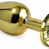 Золотистая анальная пробка с желтым кристаллом - 5,5 см.