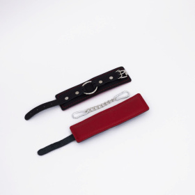 
Черно-красные кожаные наручники фото в интим магазине Love Boat