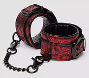 
Красно-черные наручники Reversible Faux Leather Wrist Cuffs фото в интим магазине Love Boat