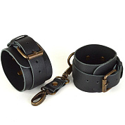 
Черные кожаные наручники IDEAL фото в интим магазине Love Boat