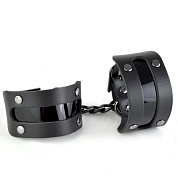 
Чёрные наручники с вставкой «Пятница» фото в интим магазине Love Boat