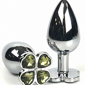 Серебристая анальная втулка с клевером из салатовых кристаллов - 6,5 см.