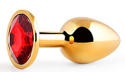 Золотистая анальная пробка с красным стразом - 7,2 см. фото в интим магазине Love Boat