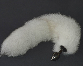 Темная анальная пробка с длинным пушистым хвостиком фото в интим магазине Love Boat