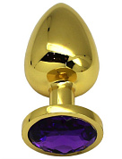 Золотистая анальная пробка с фиолетовым кристаллом - 9 см. фото в интим магазине Love Boat