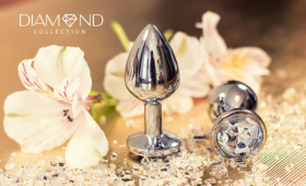 Малая серебристая анальная пробка Sparkle Small с прозрачным кристаллом - 7 см.