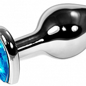 Серебристая анальная пробка с голубым кристаллом-сердечком - 9 см.