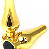 Золотистая удлиненная анальная пробка с черным кристаллом - 8 см.