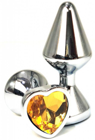 Серебристая анальная пробка с оранжевым кристаллом-сердцем - 8 см. фото в интим магазине Love Boat